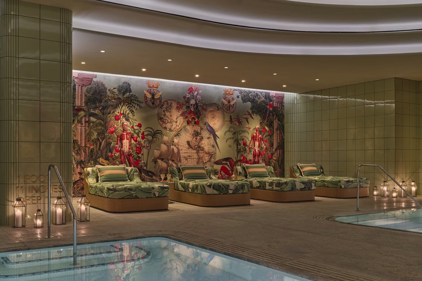 Luxury spa loungers beside an indoor pool